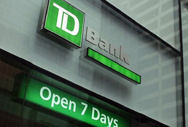 The front of a TD bank location with sign stating 'Open 7 days'